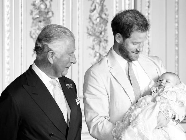 Prince Charles in one of the few meetings with his grandson Archie, soon after his birth.