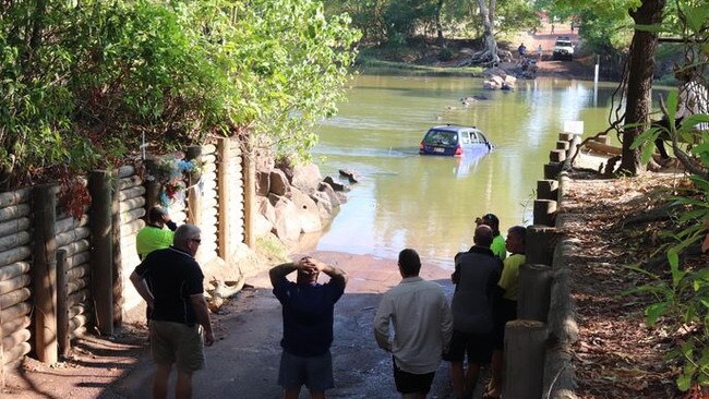 People travelling in this now waterlogged Subaru had to be rescued overnight when it became stuck at Cahills Crossing. Picture: Charlotte Ruth