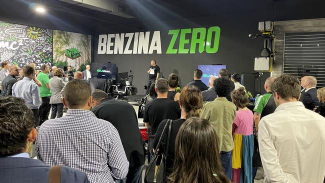 The crowd at the VIP launch of the Benzina Zero showroom at Bartons Capalaba with Bartons director, Mark Beitz, speaking.