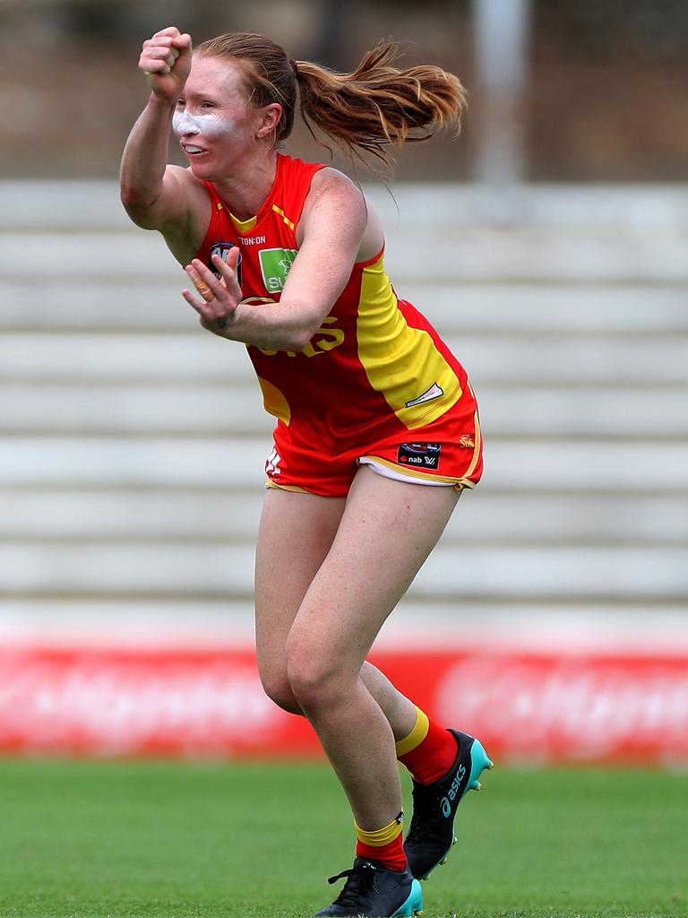 Tiarna Ernst of the Suns handballs during the AFLW 2020 season. Picture: AAP Image/Richard Wainwright.