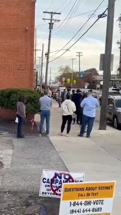 Americans line up for hours to cast their vote