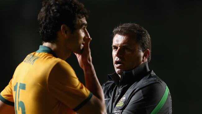 Socceroos coach Ange Postecoglou talks to Socceroos captain Mile Jedinak.