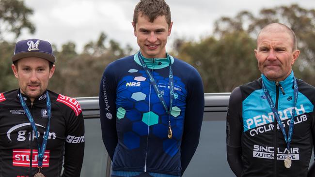 Tired and weary riders, including Peter Milostic on far right, after the NSW time trial championships.