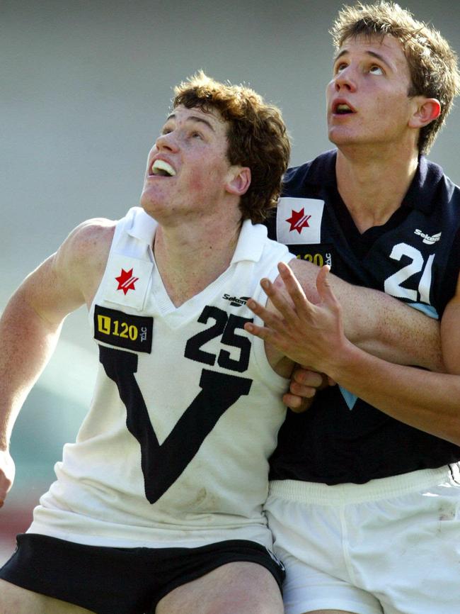 Vic Country’s Jarryd Roughead contests a boundary throw in against Vic Metro’s Ivan Maric at the 2004 under-18 championships.