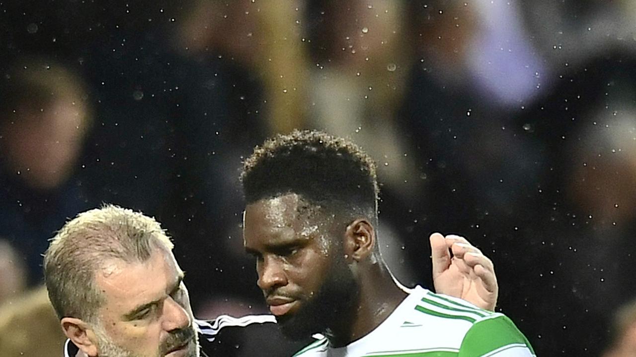 Celtic's Australian head coach Ange Postecoglou (L) taps on the shoulder Celtic's French forward Odsonne Edouard during the UEFA Champions League second round qualifying football match between FC Midtjylland and Celtic FC at MCH Arena in Herning, Denmark, on July 28, 2021. (Photo by Bo Amstrup / Ritzau Scanpix / AFP) / Denmark OUT