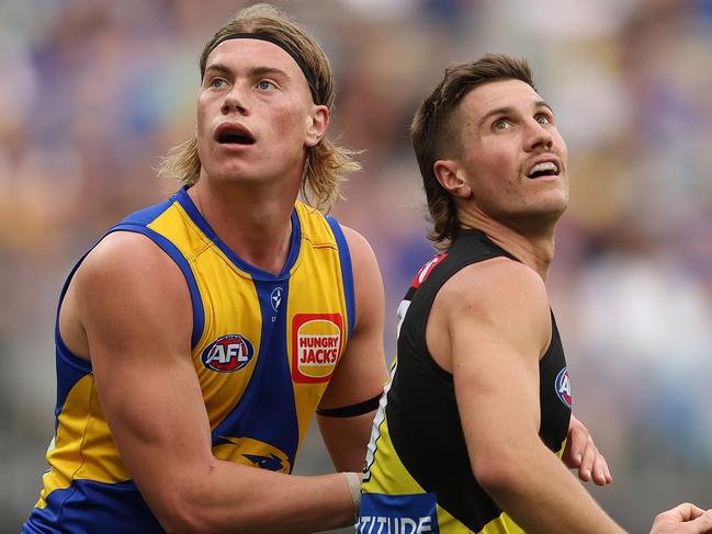 PERTH, AUSTRALIA - APRIL 14: Harley Reid of the Eagles defends Liam Baker of the Tigers during the 2024 AFL Round 05 match between the West Coast Eagles and the Richmond Tigers at Optus Stadium on April 14, 2024 in Perth, Australia. (Photo by Will Russell/AFL Photos via Getty Images)