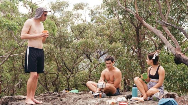 Morning tea break at Ruined Castle feat. soggy Spanish omelette and supermarket tuna pasta cups. Image: supplied