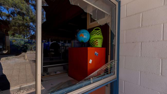 Damage to Happy Valley Primary School windows, which were smashed with hundreds of golf balls. Picture: Ben Clark