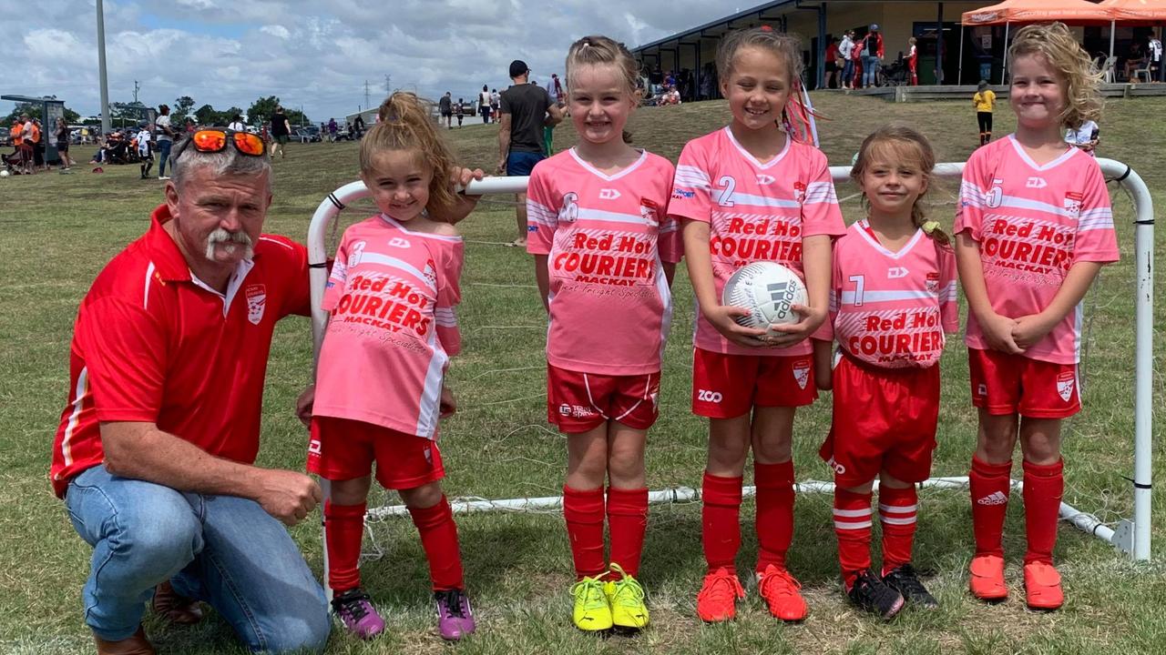 Wanderers pixies coach Scott Mealy with his team at the last game of the 2021 season (from left): Collins Read, Aquilla Dunn, Olivia Franklin, Isla Hall and daughter Niamh Dunn. Mr Mealy says he’d love to see more girls play the sport. Picture: Contributed