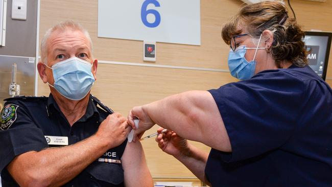 Police Commissioner Grant Stevens gets his second vaccine from registered nurse Jackie Gartner at the RAH in March. Picture: Brenton Edwards