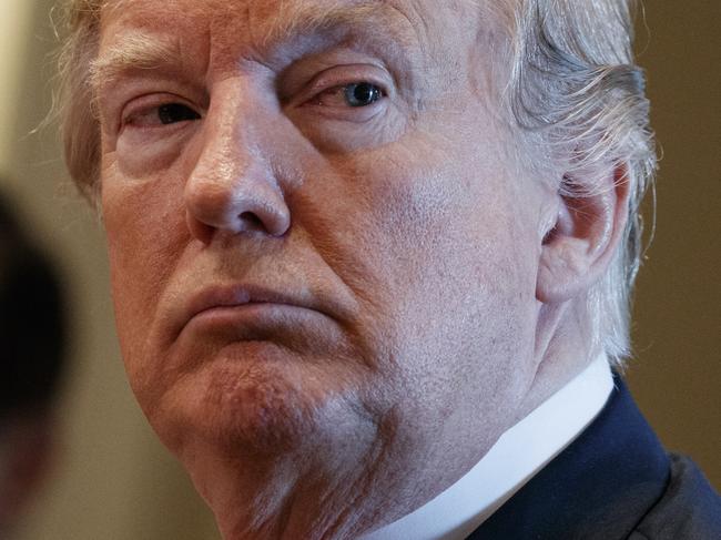 FILE - In this June 20, 2018 file photo, President Donald Trump listens during a meeting with Republican members of Congress on immigration in the Cabinet Room of the White House in Washington. The separation of families at the U.S.-Mexico border caught the attention of the world and prompted mass outrage, but it only tells a small part of the story surrounding the Trump administrationâ€™s immigration policy. (AP Photo/Evan Vucci, file)