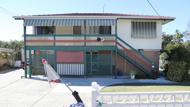 The scene of an alleged murder at Jasmine Street, Alexandra Hills.