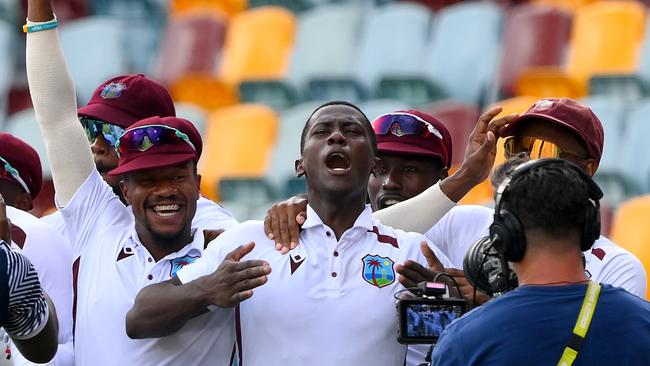 Shamar Joseph and his West Indies teammates celebrate their first win over Australia in nearly 30 years. Picture: Bradley Kanaris/Getty Images.