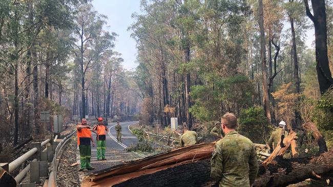 Fallen trees are blocking the only road out of Mallacoota. Picture: Department of Defence