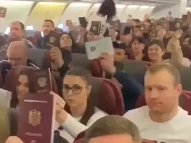 Vision shared by a Ukrainian newspaper purports to show Moldovan expats being flown home on a chartered flight to cast a vote in the country's crucial election.