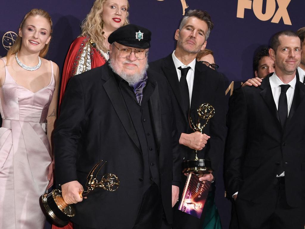 Author George R.R. Martin accepts the Emmy for Outstanding Drama Series with the Game of Thrones cast at the 2019 Emmy Awards in LA. Picture: Robyn Beck / AFP