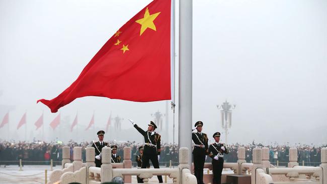 BEIJING, CHINA - JANUARY 01: The honor guards attend the flag-raising ceremony at the Tiananmen Square on January 1, 2017 in Beijing, China. About 26,000 people come to watch the flag-raising ceremony at Tiananmen Square on the first Day of 2017 in Beijing.  (Photo by VCG/VCG via Getty Images)