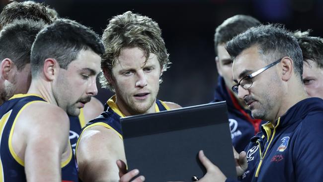 Adelaide’s Rory Atkins and Rory Sloane watch vision at three0quarter time. Picture SARAH REED