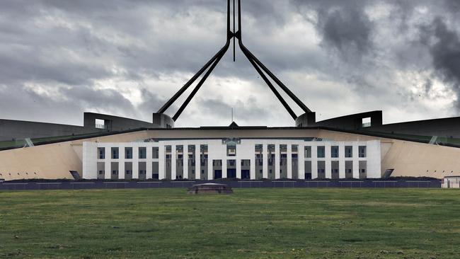 CANBERRA, AUSTRALIA NewsWire Photos - SEPTEMBER 20, 2021: COVID-19 and bad weather has kept most Canberrans inside as the ACT records 7 new cases. Storm clouds gather over Parliament House in Canberra.Picture: Newswire/Gary Ramage