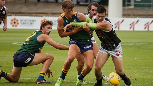 Tough Eagle Nick Hayes tries to bustle his way to the ball. Picture AAP Image/MATT LOXTON