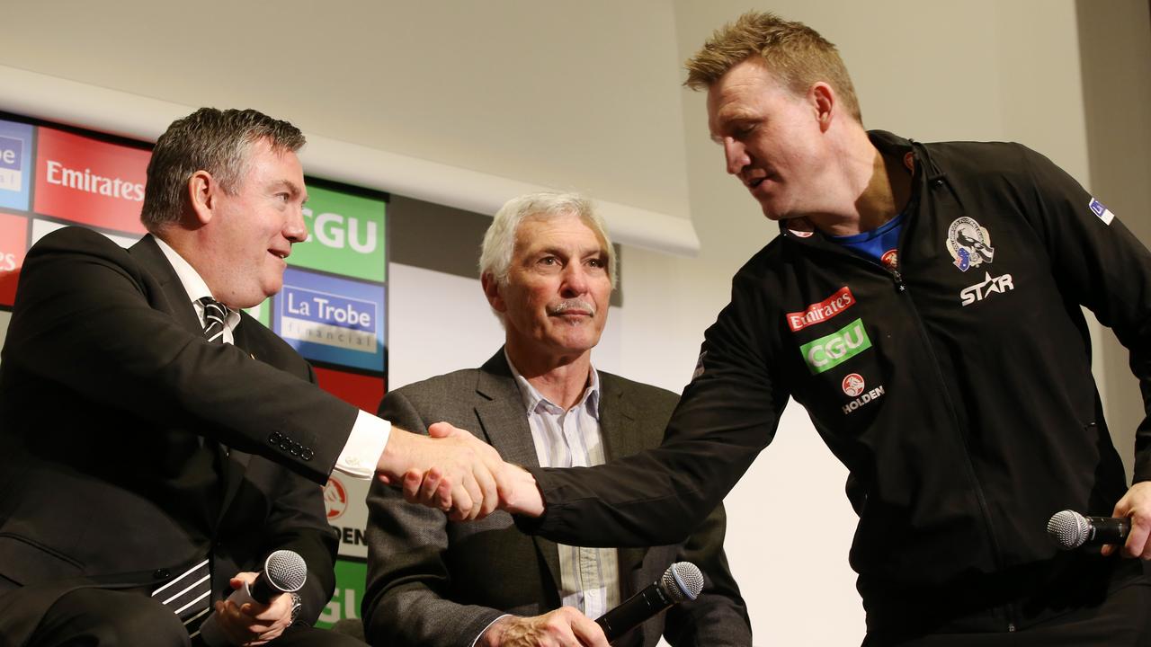Dane Swan retirement announcement. Collingwood president Eddie Maguire, former coach Mick Malthouse and present coach Nathan Buckley on stage . Pic: Michael Klein