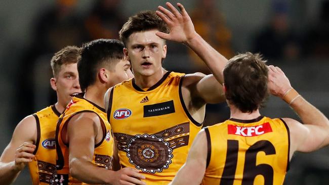 Mitch Lewis celebrates a goal with teammates this season. Picture: Dylan Burns/AFL Photos via Getty Images