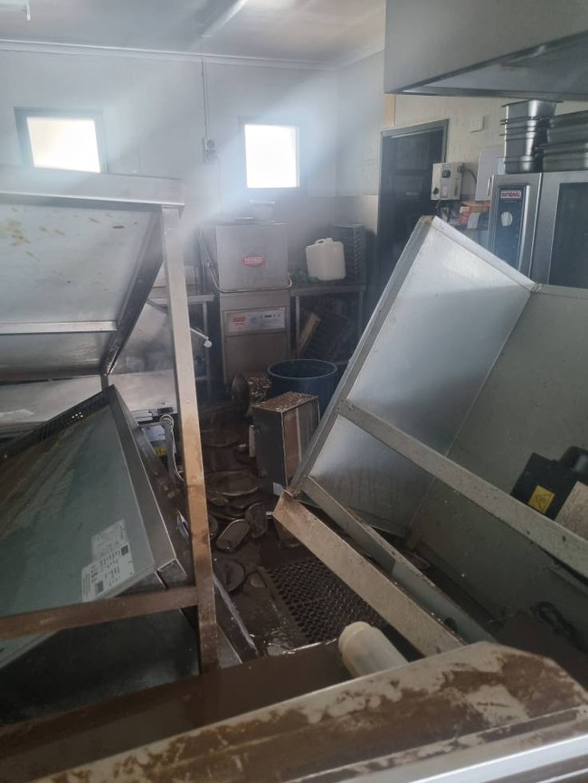 Before: Fridges were found flipped over.