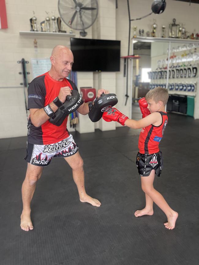 Mang gon Thai Boxing gym owner Nicolaas Van Der Zee and Archibald Gafney, 7. Photo: Zoe Devenport