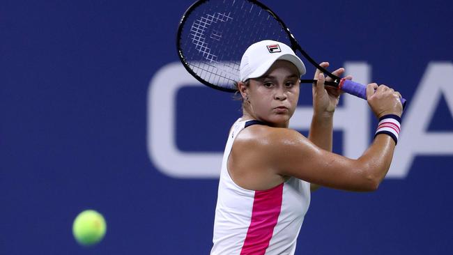 Barty keeps her focus against Lauren Davis. Picture: AFP