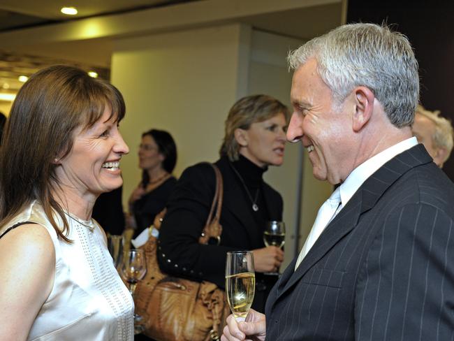 Professor Catherine with media executive John Hartigan. Picture: Timothy Clapin