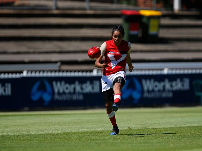 Margaret Varcoe playing for North Adelaide Football Club.