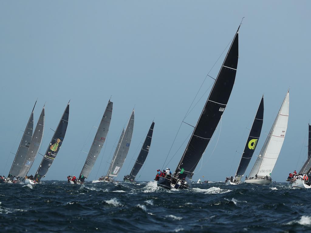 Yachts leave Sydney Harbour during the start of the 2019 Sydney Hobart Yacht Race in Sydney. Picture: Brett Costello