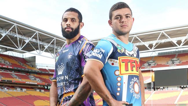 Storm’s Josh Addo-Carr and Titans’ Ash Taylor.