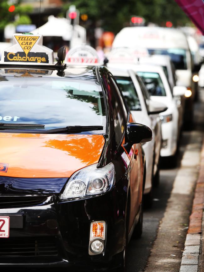 Taxis queue at the Albert Street rank in Brisbane’s CBD. Picture: Tara Croser.