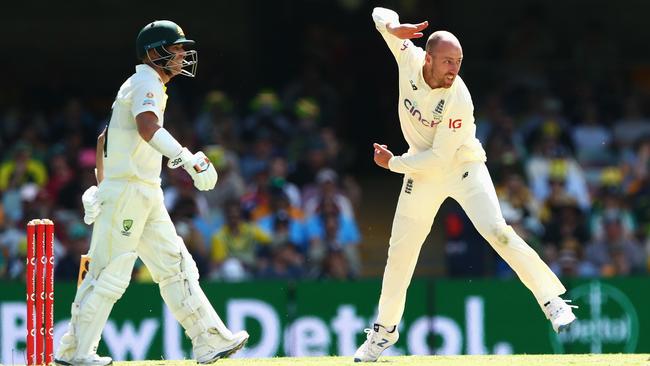 Jack Leach bowls for England as Australia’s Alex Carey look son. Picture: Getty Images