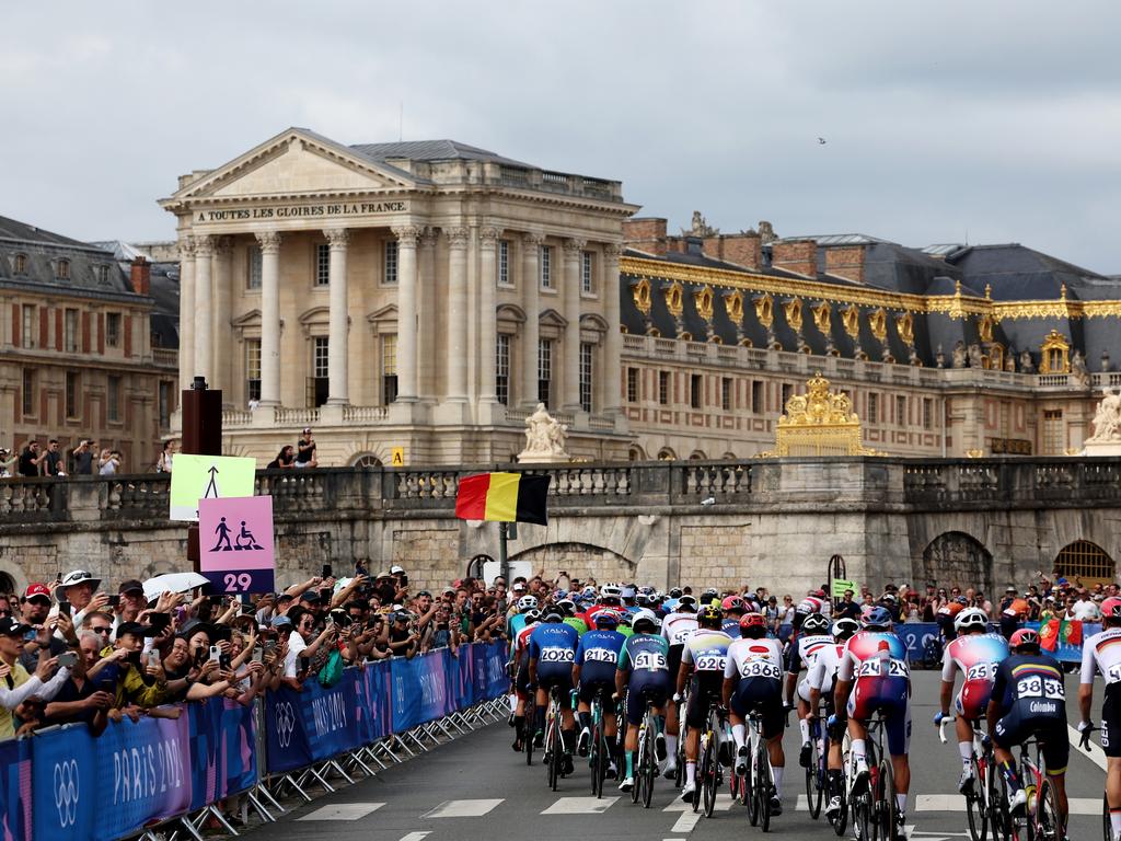 The peloton in the men’s road race passes the Palace of Versailles. (Photo by Tim de Waele/Getty Images)