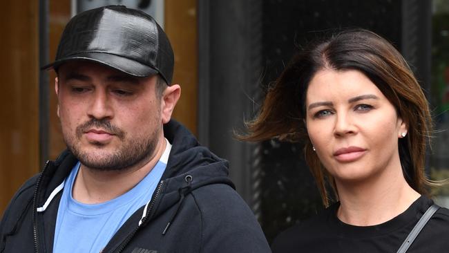 Lone Wolf bikie associate Erkan Keskin and his wife Kirtsen leave the Downing Centre Local Court in 2018. Picture: AAP