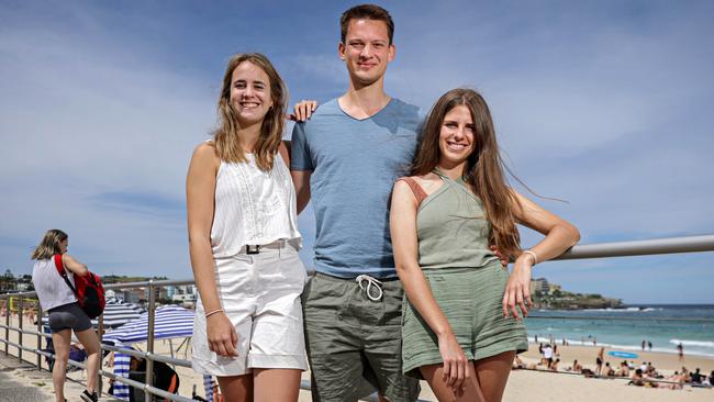 Back packers Teresita Calvo, 22, Felix Burdzik, 24, and Ines Marin Murillo, 22, at Bondi Beach on Sunday. Picture: Adam Yip