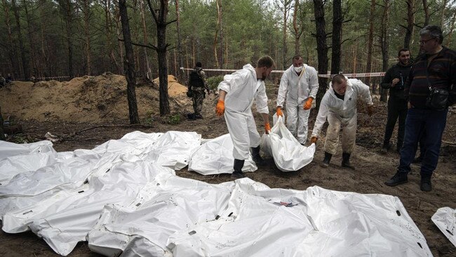 Bodies are being exhumed for examination after the discovery of the graves. Picture: Evgeniy Maloletka/AP/The Times