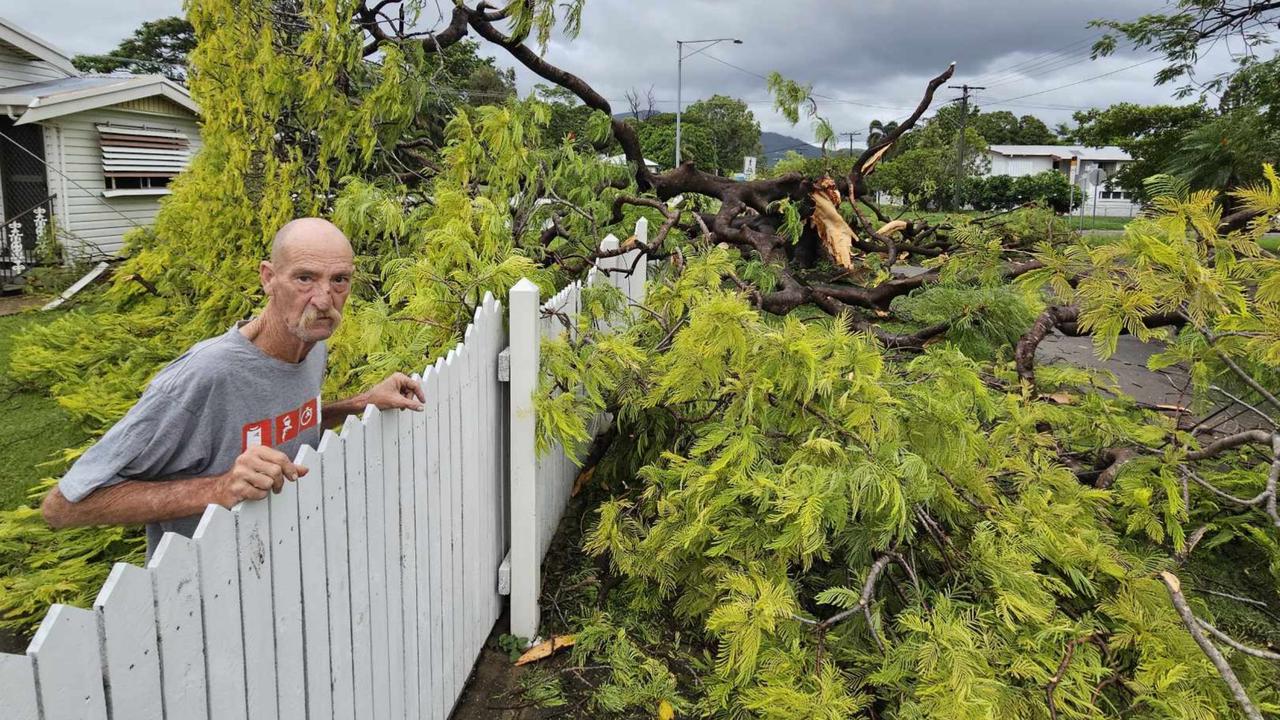 Mundingburra resident Peter Austin assess the damage outside his home. Picture: Natasha Emeck