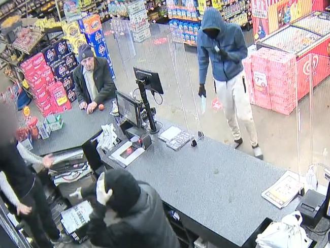 CCTV footage of three men robbing the Cheltenham IGA at knifepoint. Picture: Nine News