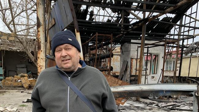 Oleksander, 63, a local fisherman, stands in front of a section of Ochakiv Market destroyed by Russian artillery fired from Kinburn Spit. Picture: Richard Lloyd Parry/The Times