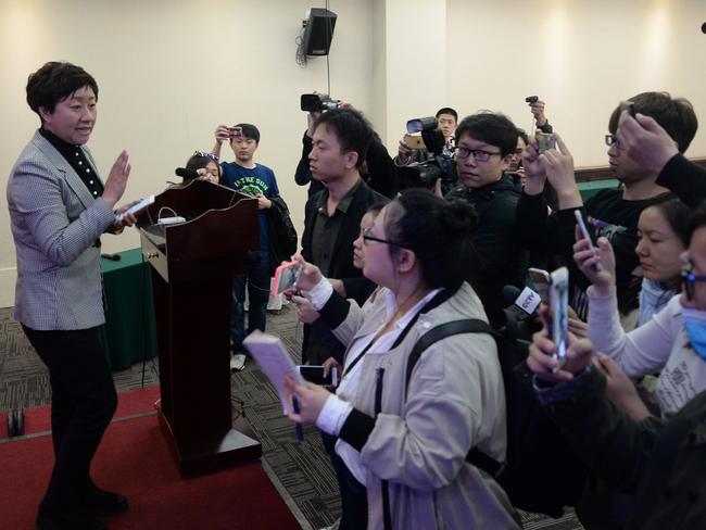 Yitel hotel manager Liu Hongni addresses the media as video footage of the assault goes viral on social media. Picture: AFP / STR