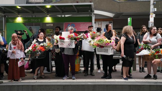 Members of the public left flowers on the 86 tram in her memory. Picture: Stefan Postles