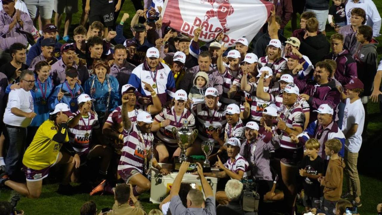 Dalby Diehards players and supporters celebrate winning the TRL Hutchinson Builders A-grade premiership.