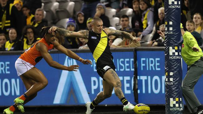 Dustin Martin soccered though this late goal before accidentally cleaning up the goal umpire. Picture: Michael Klein