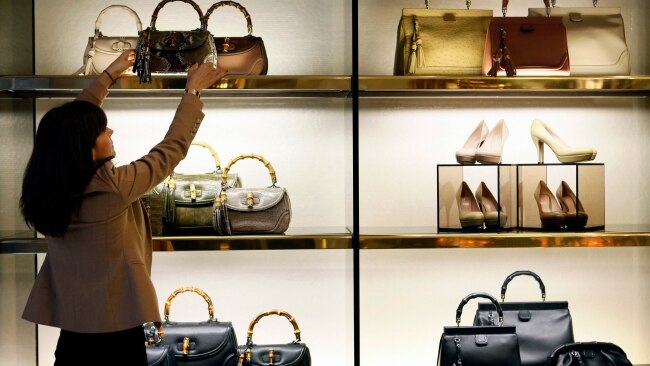 Handbag shopping at Gucci in Rome.