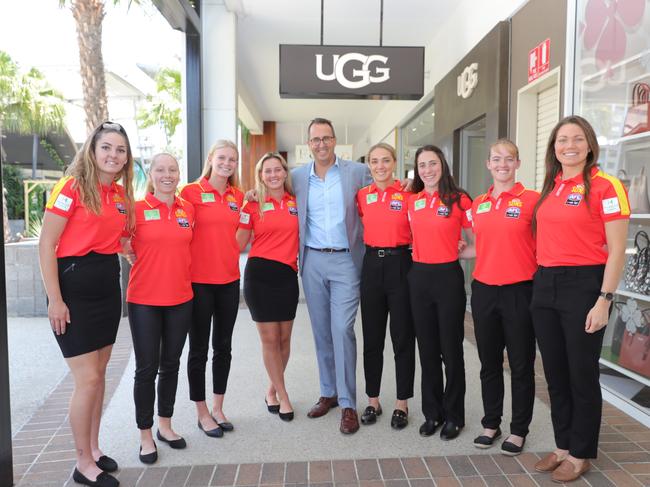 Harbour Town Centre Manager Greg Day (middle) announces their sponsorship for the Gold Coast Suns AFLW team and then shows the team around. Pictured from left is Alexia Hamilton, Georgia Breward, Serene Watson, Dee Heslop, Hannah Dunn, Cheyenne Hammond, Brittany Perry and Jade Pregelj. Picture: Glenn Hampson.