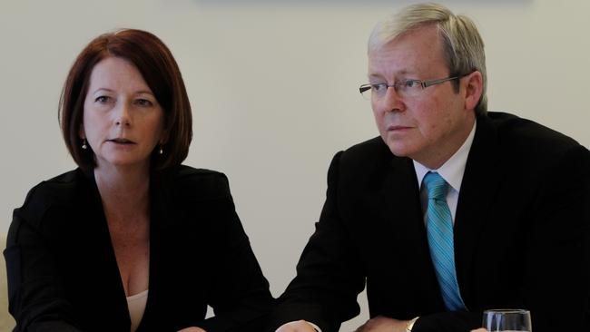 Then prime minister Julia Gillard meets with Kevin Rudd to discuss the 2010 in Brisbane.