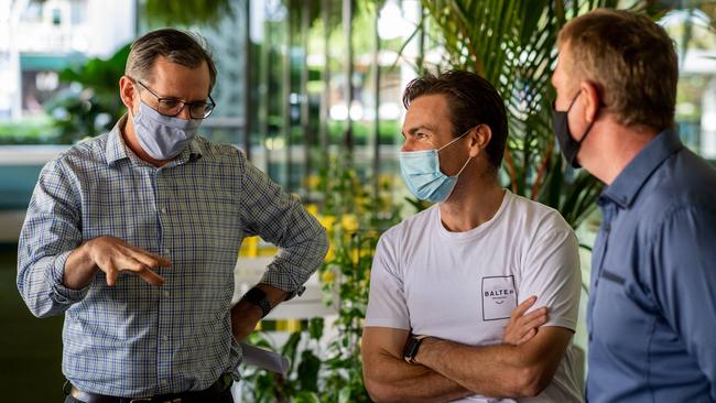 Chief Minister Michael Gunner chats with David Robinson, owner of Snapper Rocks. Picture: Che Chorley